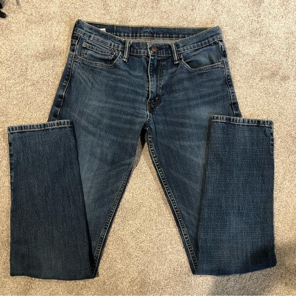 Unisex Levi’s 511 style medium wash jeans black label and red tab 32 x 34